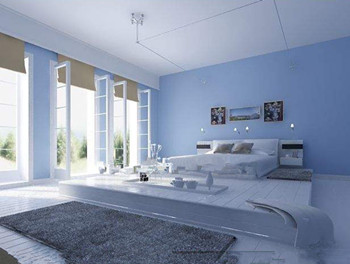 Comfortable minimalist light blue bedroom