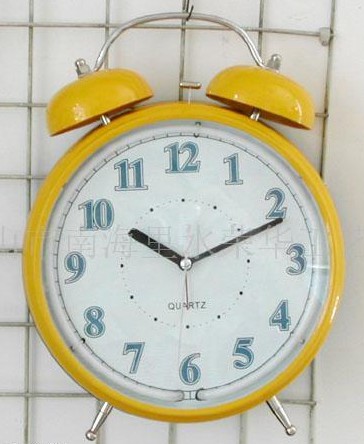 Yellow cartoon small alarm clock